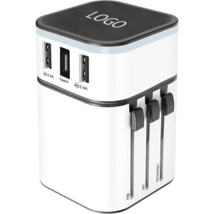 A white and black Luminous Travel Adapter with multiple USB ports and a logo on top.