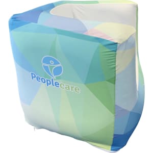 An inflatable one-seat sofa in blue and green geometric patterns, featuring a logo on the side.