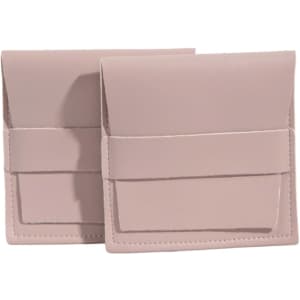 Two pale pink PU leather flip jewelry pouches with a simple design and a front pocket.
