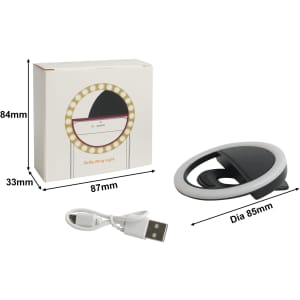 A ring selfie light in black and white, accompanied by a USB charging cable and a box featuring a logo.
