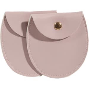 A oval PU leather jewellery pouch in a soft pink shade with a metal snap closure and a sleek design.