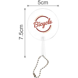 A clear PVC hand fan with a keychain, featuring a circular design and measuring 5x7.5 cm.