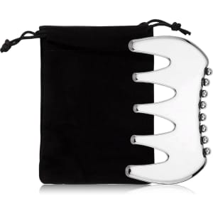 A silver 2 in 1 scraping board next to a black pouch for storage. The board has a smooth, curved design.