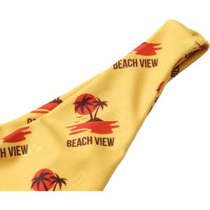 A yellow bikini bottom featuring palm tree and sunset patterns, with a logo visible.