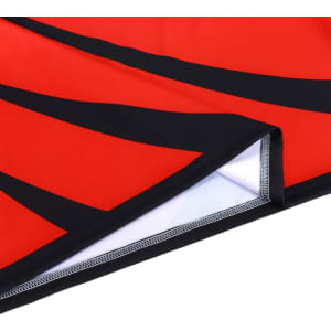 A vibrant red and black polyester micro mesh fabric, showcasing a crew neck design with raglan sleeves and a logo.