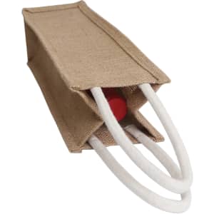 A jute wine carrier in beige with white rope handles, designed to hold a drink bottle securely.