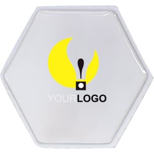 A hexagon-shaped flash drive in a clear design with a logo.