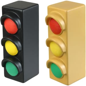 A black and gold traffic light-shaped stress reliever featuring red, yellow, and green elastic buttons.