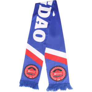 A blue and white knitted polyester scarf with red accents and tassels, featuring a logo.