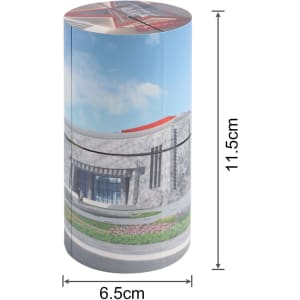 A cylindrical puzzle with a colourful design, measuring 6.5 cm by 11.5 cm, featuring a scenic architectural image.