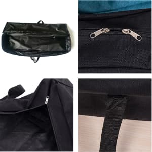 A black bag featuring a zip closure and carrying handles, displayed from different angles to show details.