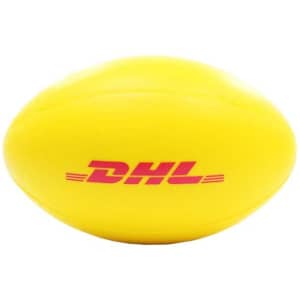 A yellow stress ball shaped like a rugby ball, featuring a logo in red.