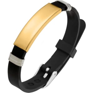 A black silicone bracelet with a shiny gold metal plate and silver accents. It features a logo on the plate.