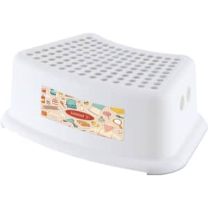 A white step stool with a textured surface and a colourful graphic on the side. It has a rounded shape and is sturdy.