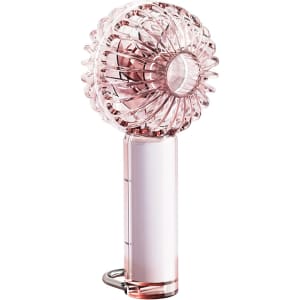 A transparent pink fan featuring an LED light, with a decorative circular design and a cylindrical handle.
