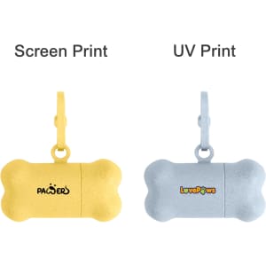 A bone-shaped pet waste bag dispenser in yellow and blue, featuring a clip and branding on each.