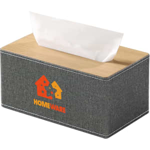 A large tissue box with a grey fabric exterior and a wooden top, featuring a logo on the front.