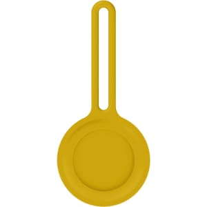 A yellow Air Tag protective case with a loop for attachment, featuring a smooth, minimalist design.