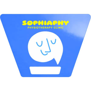 A blue triangular sign with a smiling face graphic and a logo for a physiotherapy clinic.