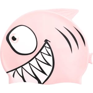 A pink silicone swim cap in the shape of a fish, featuring a large smiling face and black detailing.