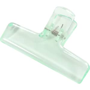 A translucent green plastic clip with a spring mechanism for securing items together.
