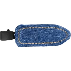 A denim hair clip in a blue hue with a stitched design and a black clasp. It features a branding logo.