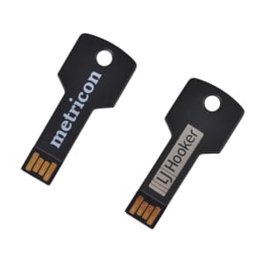 Two black square key flash drives are displayed, featuring metal connectors and distinct branding on each.
