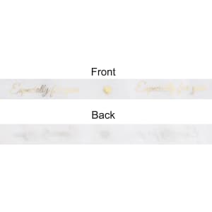 A transparent organza ribbon, featuring gold text on both sides that reads "Especially for you."