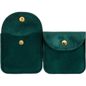 A square velvet jewelry pouch in deep green, featuring a gold snap closure and two compartments.