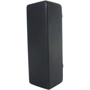 A black, rectangular stress reliever with a smooth surface and rounded edges. It features a logo.