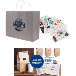 A grey kraft paper bag with a twisted handle and a circular logo, accompanied by various decorative stickers.