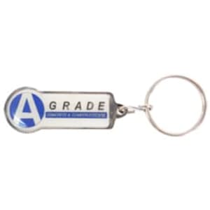 A custom-shaped embossed soft enamel keyring in silver and blue, featuring a logo.