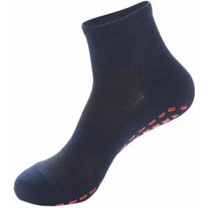 Crew Kids Gripper Socks in navy with red grips on the sole, featuring a breathable design and a logo.