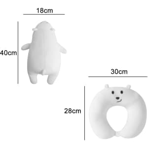 A bear-shaped, white travel pillow with dimensions and a logo, featuring a cute face and soft texture.