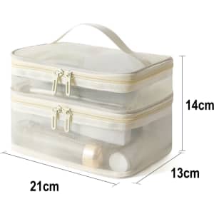 A transparent nylon mesh double-layer cosmetic bag in cream, featuring two zip compartments and a handle.