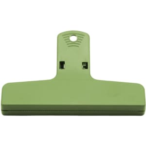 A green plastic magnetic clip with a flat base and a hanging hole at the top. It features a logo on the surface.