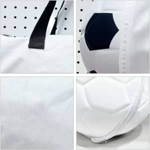 A foldable duffel bag in white with a black and white soccer ball design. Features a zipper and handle.