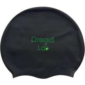 A black swimming cap featuring a logo in green. Designed for use in various water sports.