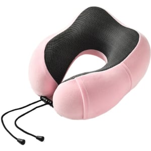 A pink and black memory foam U-shaped travel pillow with adjustable cords, featuring a soft exterior and a textured interior.
