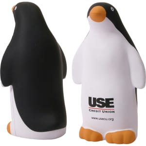 A penguin-shaped stress reliever in black, white, and orange, featuring a logo on its side.