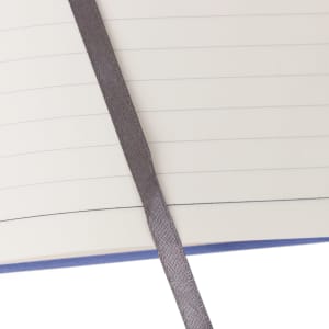 A B5 notebook with a full colour cardboard cover, featuring lined pages and a grey ribbon bookmark.