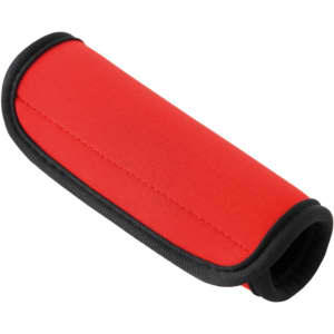 A red neoprene luggage grip with black trim, featuring a smooth, cushioned surface and an ergonomic design.