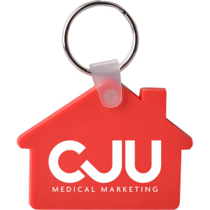 A red house-shaped keyring featuring a metal ring and a branding logo.