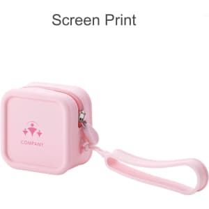 A pink square silicone coin pouch with a zipper and a wrist strap, featuring a logo on the front.
