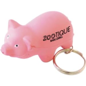 A keyring featuring a pink mini pig stress item, with a branding logo on its side.