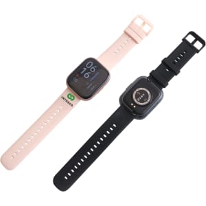 A square smart watch in pink and black, featuring a digital display and silicone straps. Includes a logo on the pink band.
