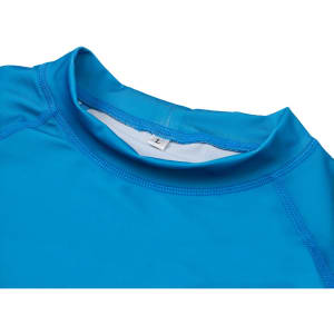 A bright blue UPF 50+ rashie featuring long sleeves and a high collar, with a tag visible inside.
