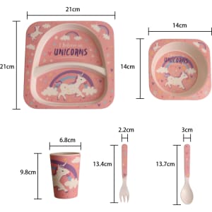 Bamboo fibre tableware set in pink, featuring unicorn designs; includes a plate, bowl, cup, fork, and spoon.