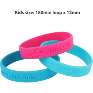 Three silicone wristbands in pink and light blue, featuring a logo on each band. They are designed for kids.