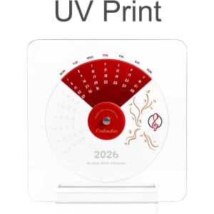 Acrylic desk calendar with a red and white design, featuring dates and decorative elements for the year 2026.